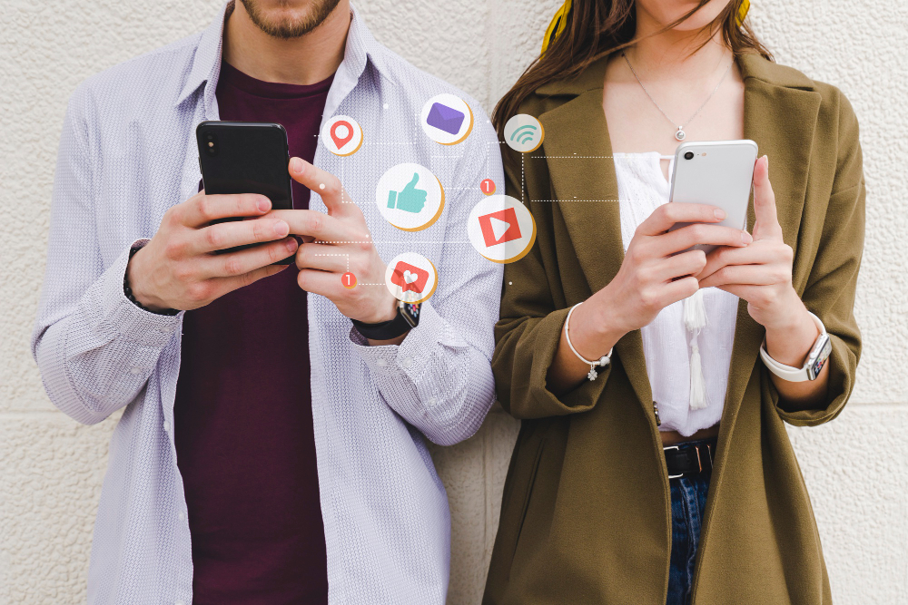 mobile-notification-icons-man-woman-using-cell-phone